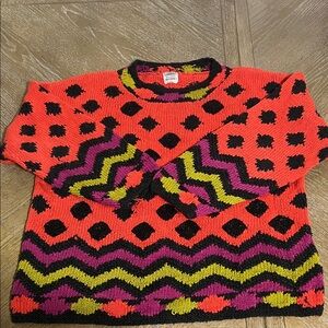 Bold Red and Black Patterned Sweater
